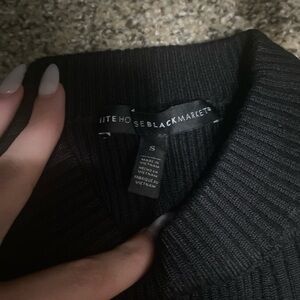 Black turtleneck short sleeved. Looks brand new only wore 3 times!